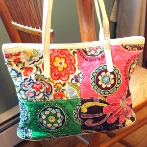 Vera Bradley 4 pattern and leather handbag..